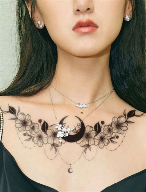 small upper chest tattoo female|300+ Beautiful Chest Tattoos For Women (2024) Girly。